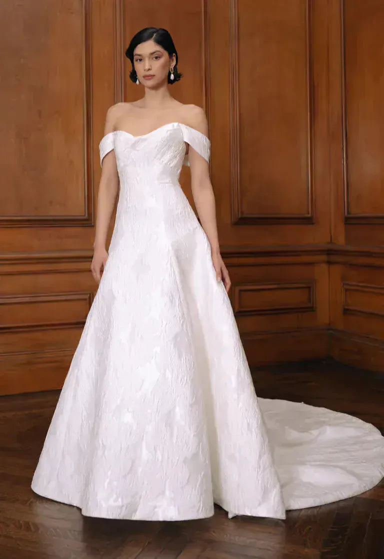 jenny yoo white dress Chaya l Preowned Little l Los Angeles catching dress is sure to make a lasting impression. Your bridal wardrobe starts here.