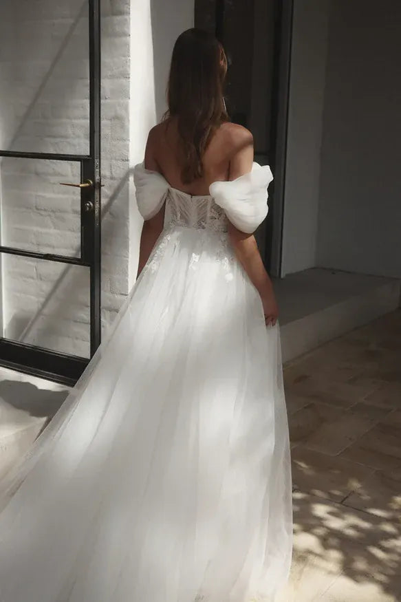 full back of alena leena clivia ivory tulle a-line wedding dress with a sweetheart neckline and detachable straps