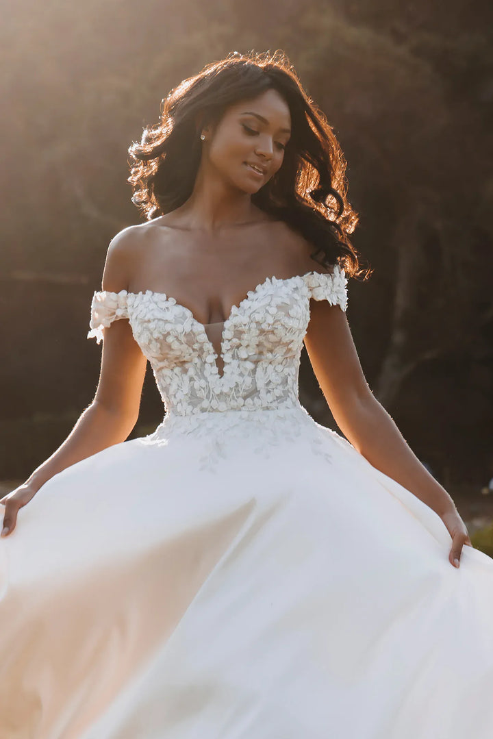 close up of allure 9908 ivory satin a-line wedding dress showing the floral lace embellished bodice