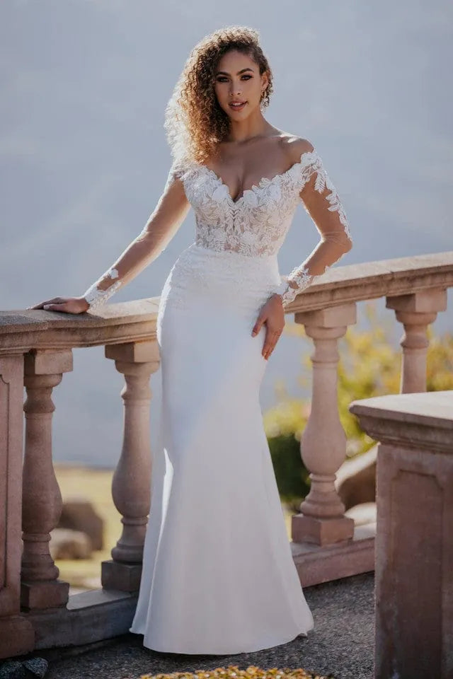 full front of allure a1166 ivory crepe sheath wedding dress with a v neckline and long sleeves