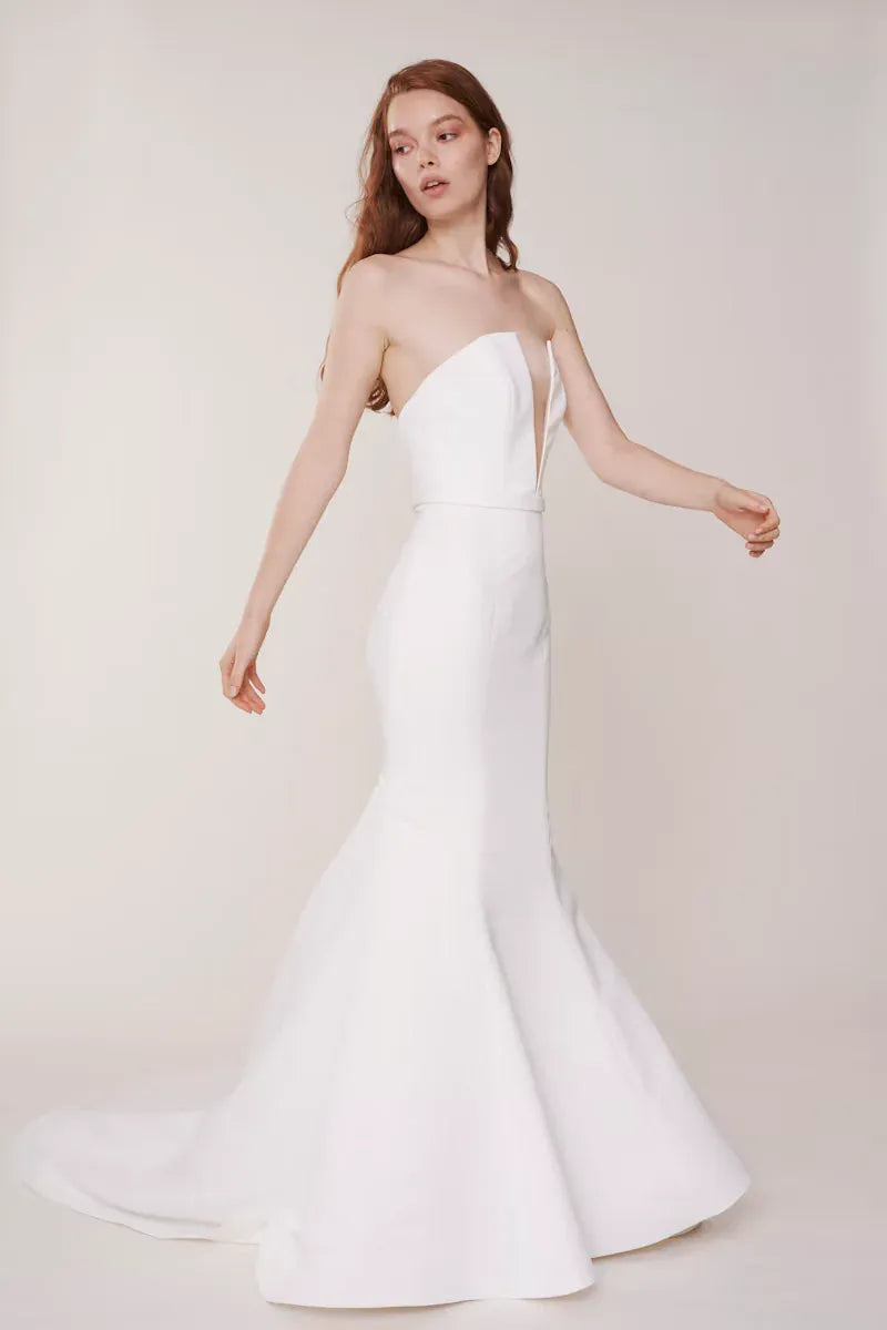 full front of alyne windsor ivory satin fit and flare wedding dress with a notched v neckline