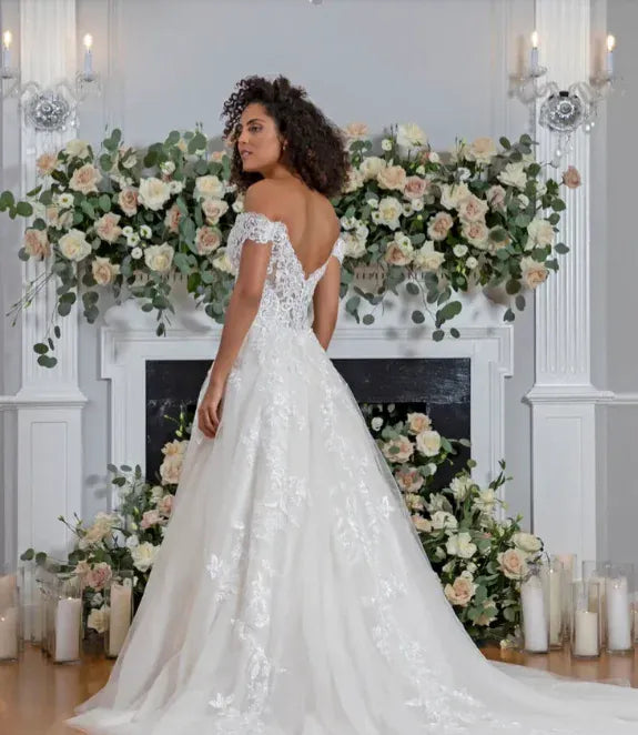 back of flores by angel rivera wish ivory tulle a-line wedding dress with floral appliques throughout and off the shoulder straps