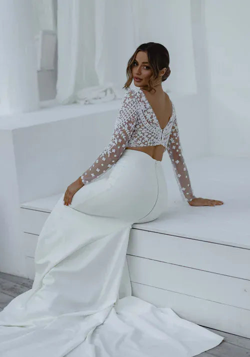 full back of anna campbell lissia ivory lace topper with an illusion neckline and long sleeves
