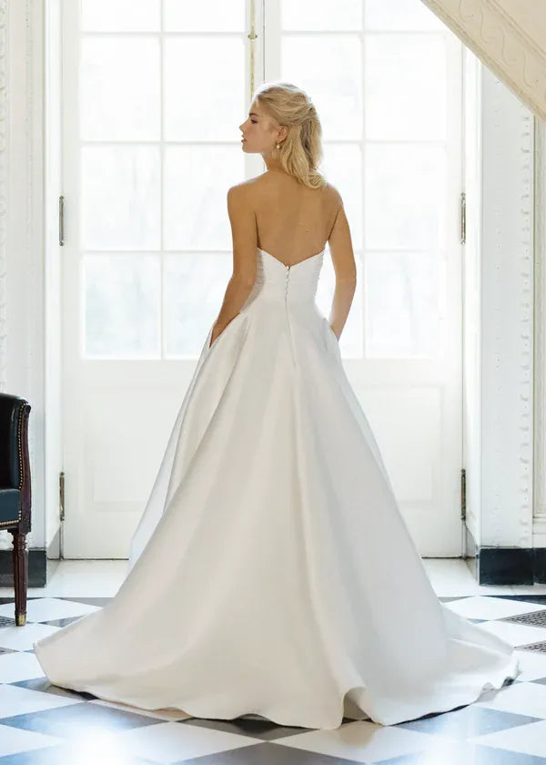 back of anne barge callanwolde ivory mikado a-line wedding dress with an open back and short train
