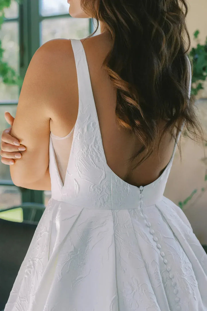 close up of anne barge coraline jacquard a-line wedding dress with an open back