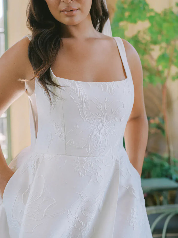 close up of anne barge coraline jacquard a-line wedding dress with a square neckline 