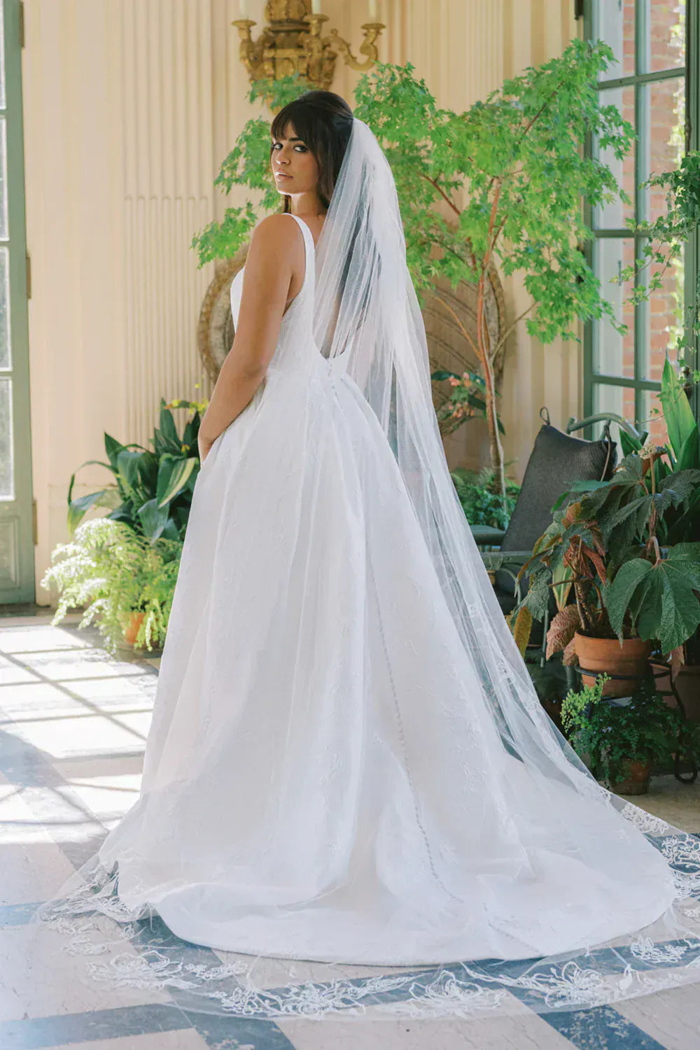 full back of anne barge coraline jacquard a-line wedding dress with a square neckline and slit in the skirt
