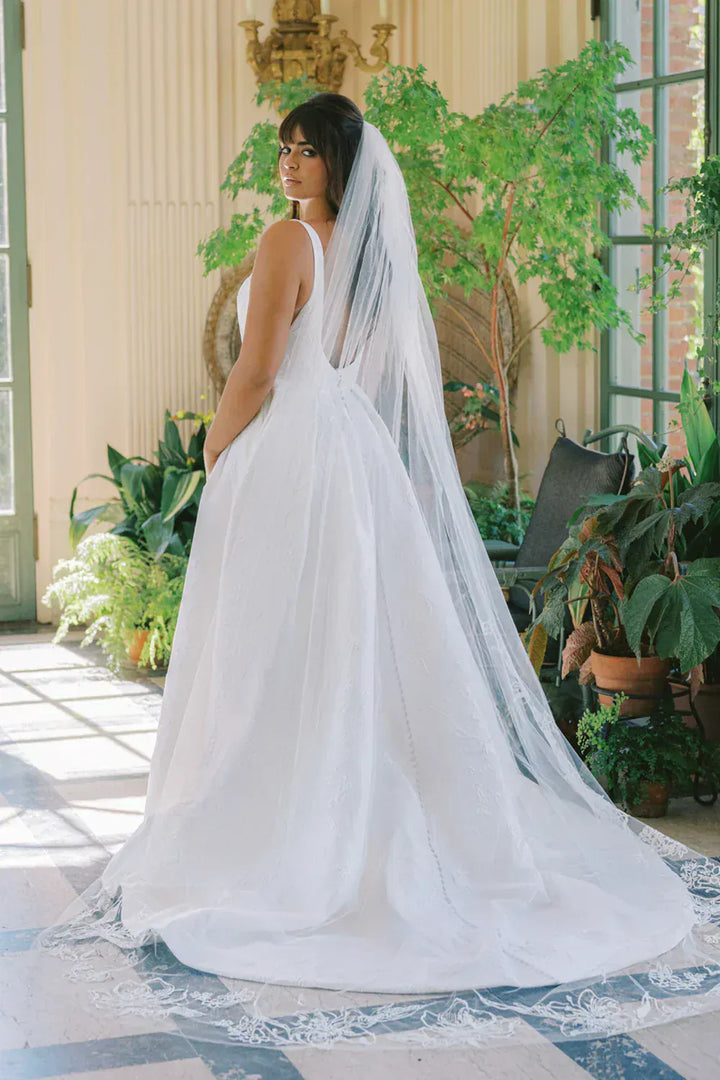 full back of anne barge coraline jacquard a-line wedding dress with a square neckline and slit in the skirt