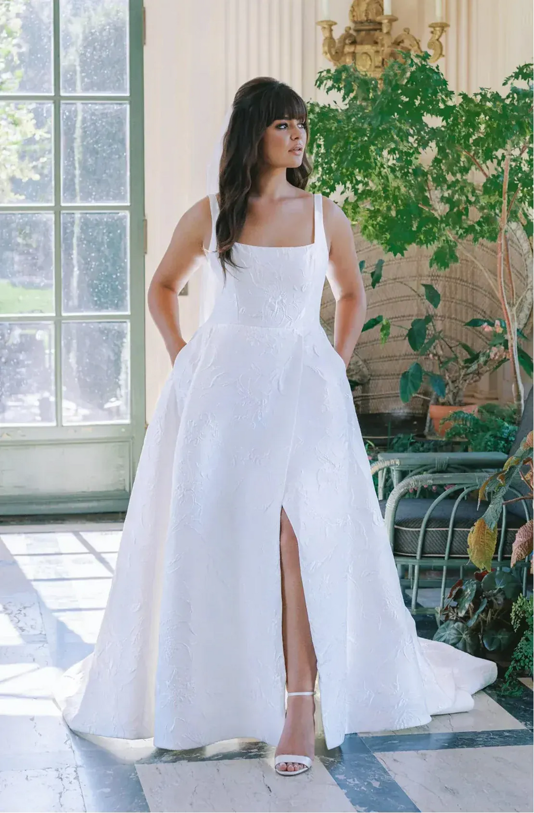full front of anne barge coraline jacquard a-line wedding dress with a square neckline and slit in the skirt