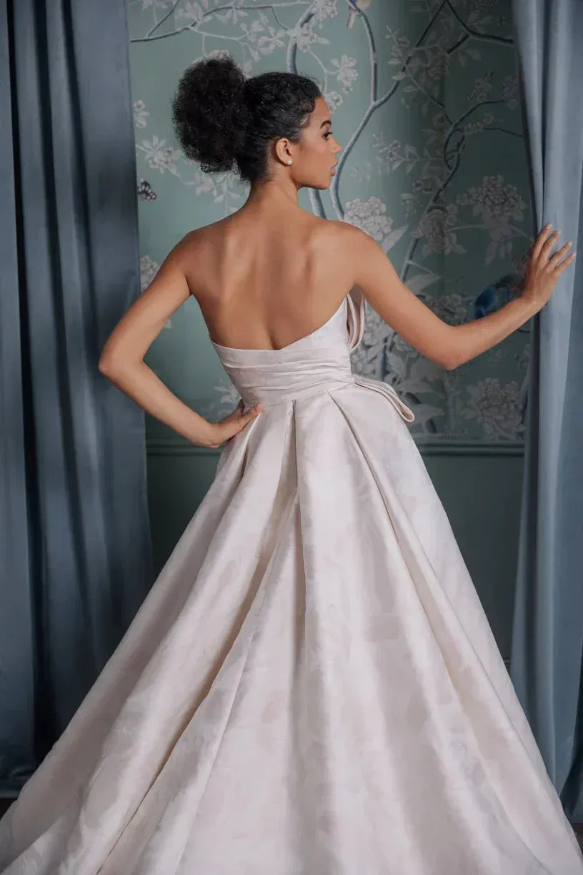 back of anne barge montecito blush jacquard ball gown wedding dress showing the floral print throughout