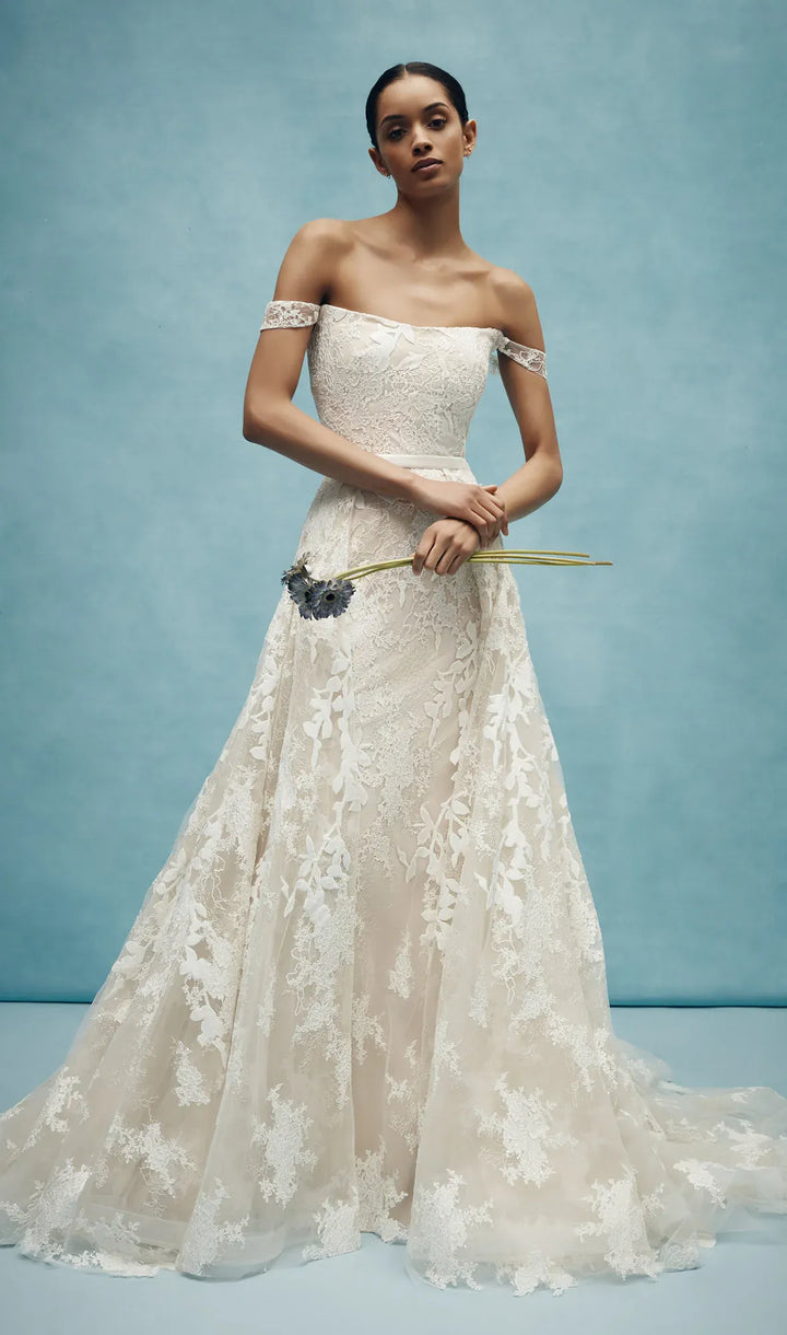 full front of anne barge walton lace fitted wedding dress with a matching overskirt