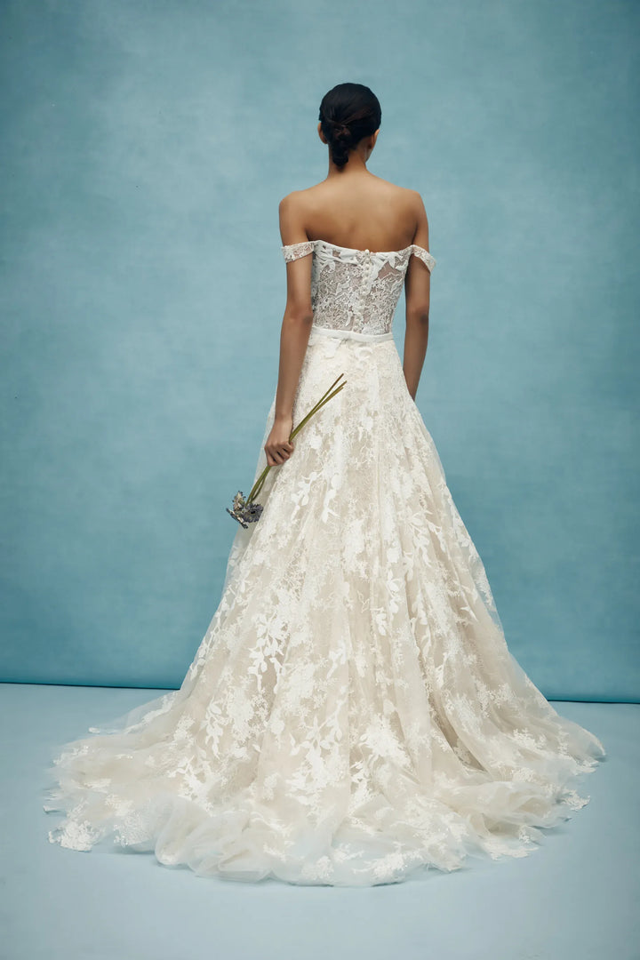full back of anne barge walton lace fitted wedding dress with a matching overskirt