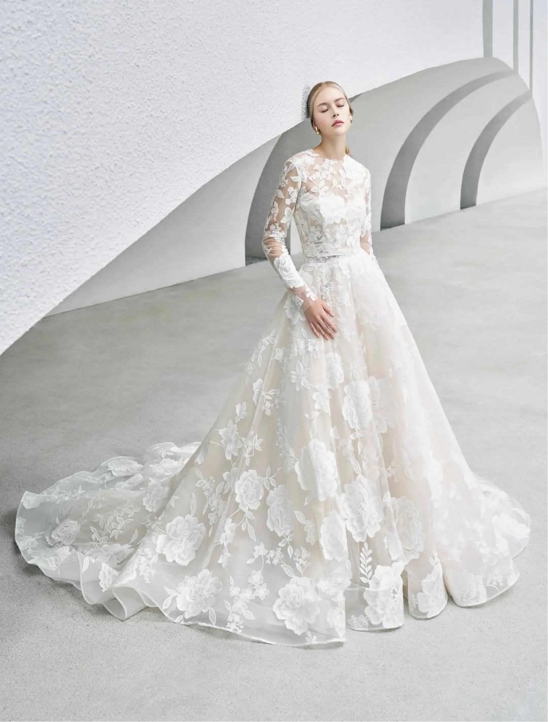 White lace wedding dress on a neutral background