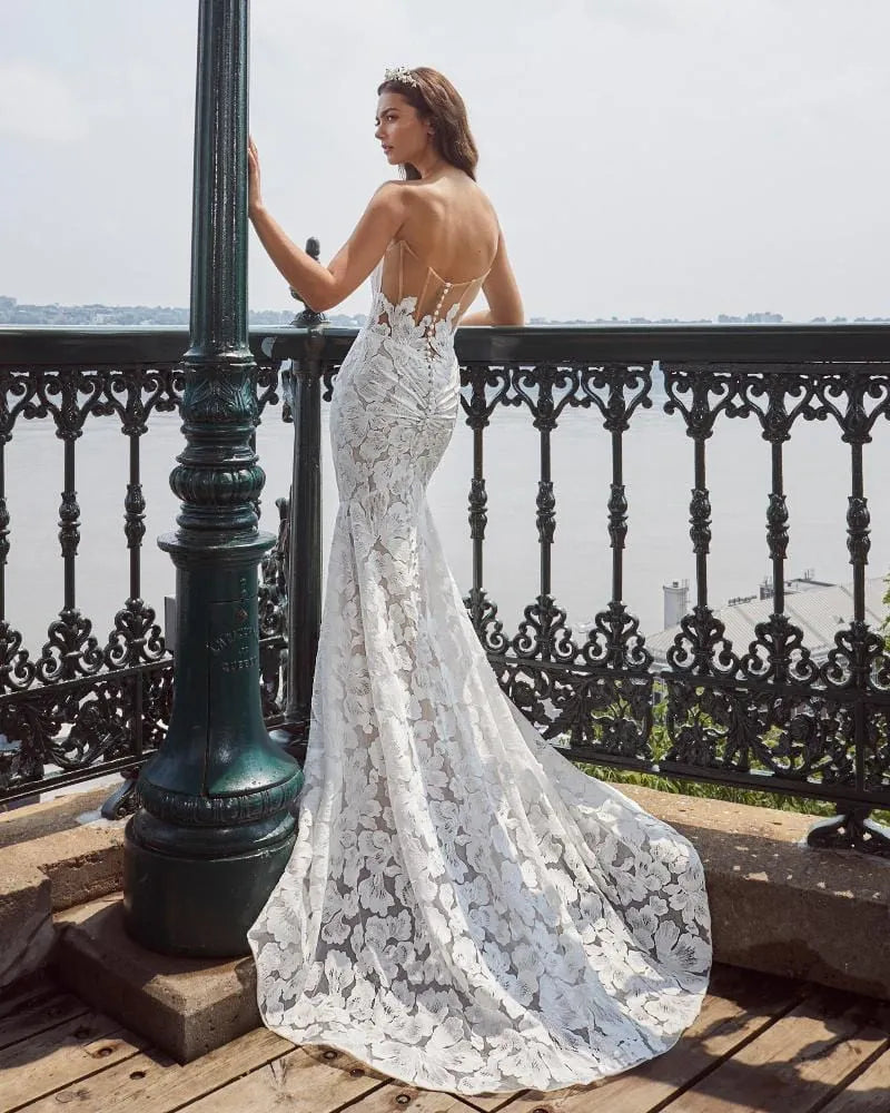 back of calla blanche jill champagne lace fit and flare wedding dress with sheer back and short train