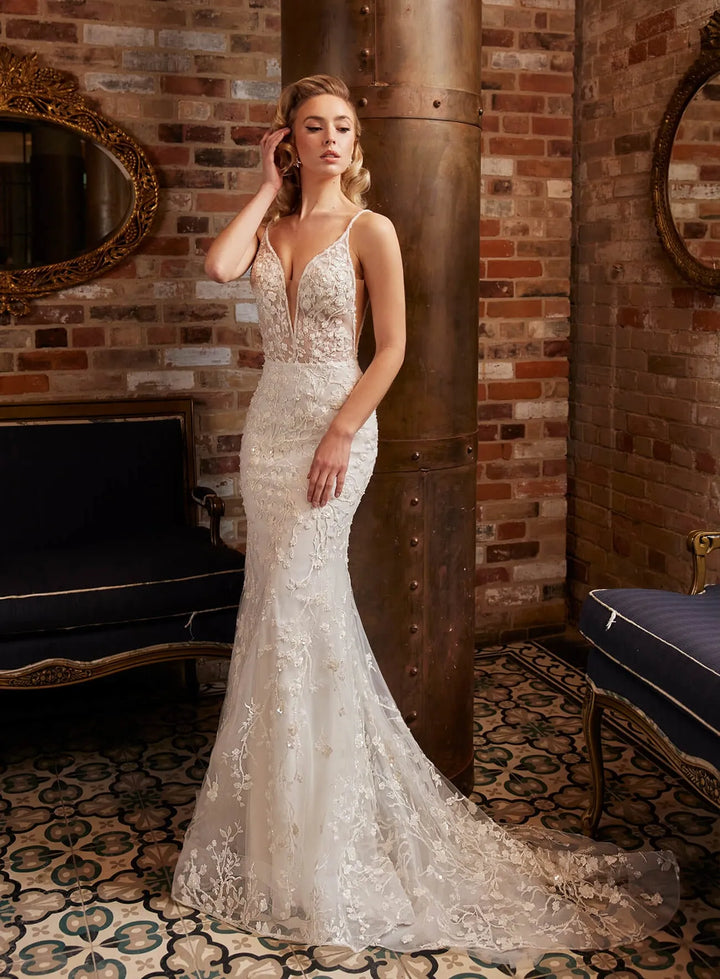full front of calla blanche june ivory beaded lace fit and flare wedding dress with a deep v neckline