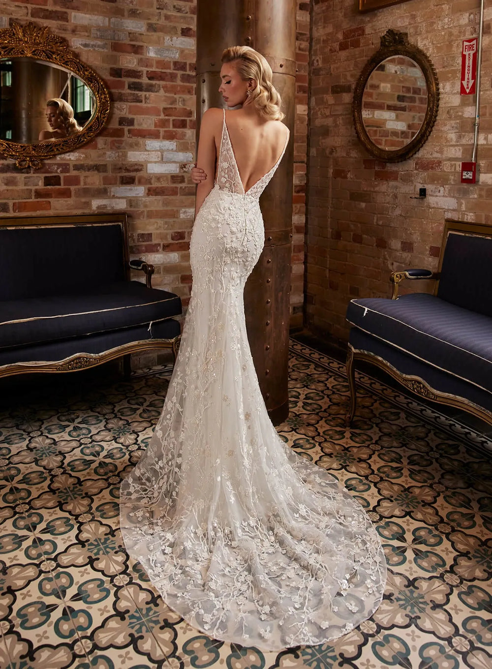 full back of calla blanche june ivory beaded lace fit and flare wedding dress with an open back