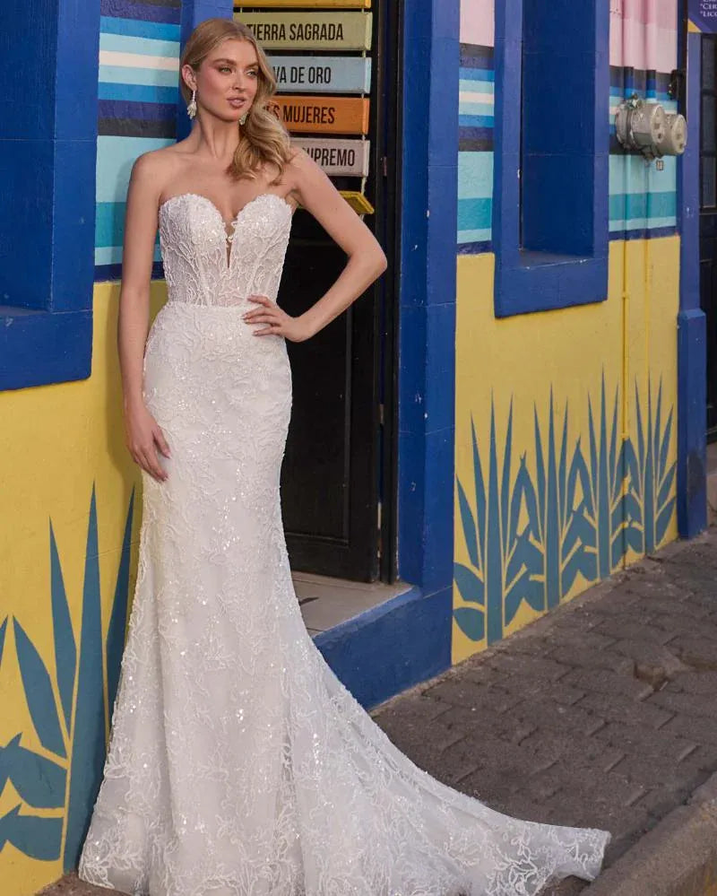 full front of calla blanche madeline ivory fitted lace wedding dress, shown without the matching dimensional overskirt