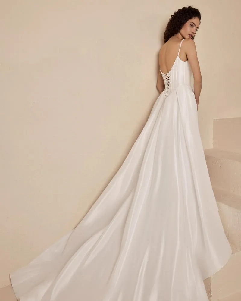 back of blanc by calla blanche nura ivory taffeta fitted wedding dress with lace up corset back and flowy skirt