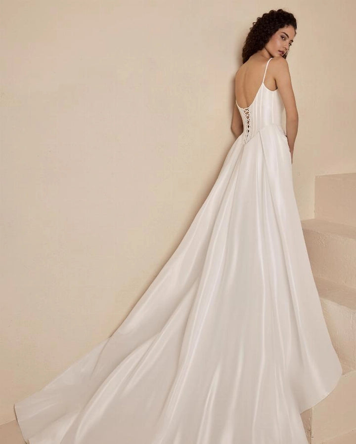 back of blanc by calla blanche nura ivory taffeta fitted wedding dress with lace up corset back and flowy skirt