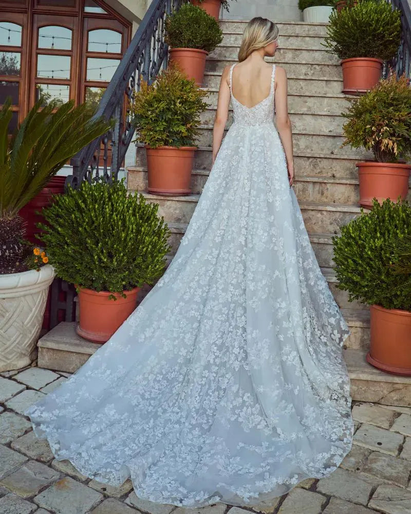 full back of calla blanche reagan nude lace and tulle a-line wedding dress with a square neckline and thin straps, with a chapel length train