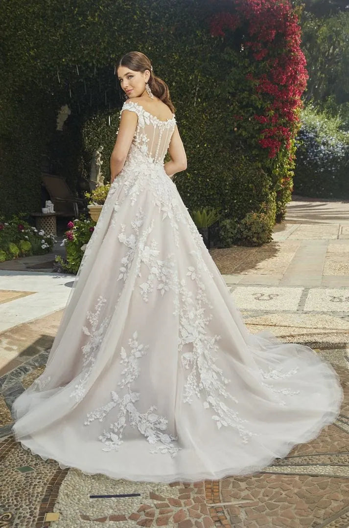 full back of casablanca 2406 blush tulle ball gown wedding dress with lace appliques and an off the shoulder neckline, with a short train