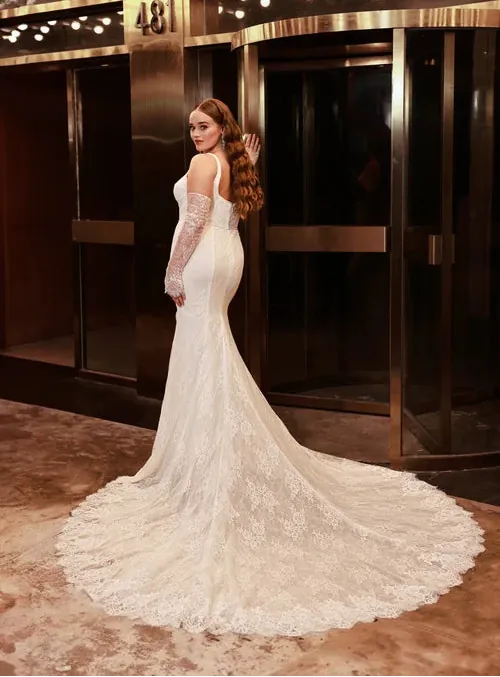 full back of dany girl celeste ivory lace fitted wedding dress with matching long sleeves and a lace train