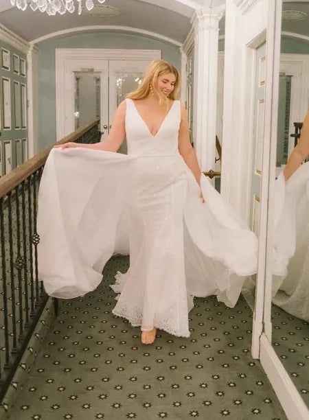 front of dany girl margery ivory lace fit and flare wedding dress with a tulle overlay and v neckline