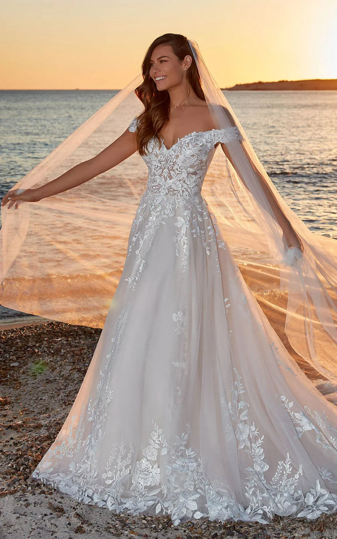 full front of eddy k dr2301 ivory tulle a-line wedding dress with scattered lace appliques and an off the shoulder neckline