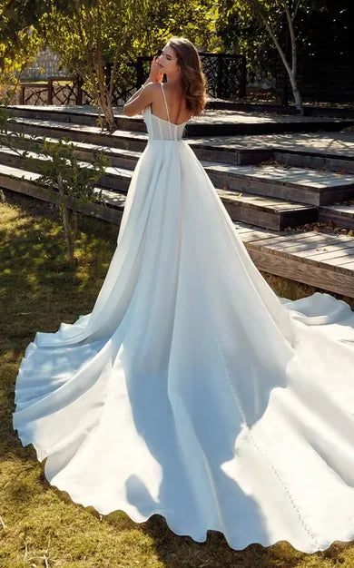 full back of eddy k chrissy nude organza a-line wedding dress with a long train