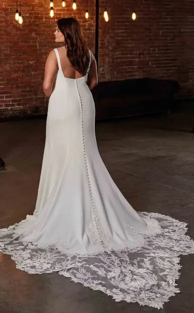full back of eddy k dylan ivory crepe fitted wedding dress featuring a long shaped lace train