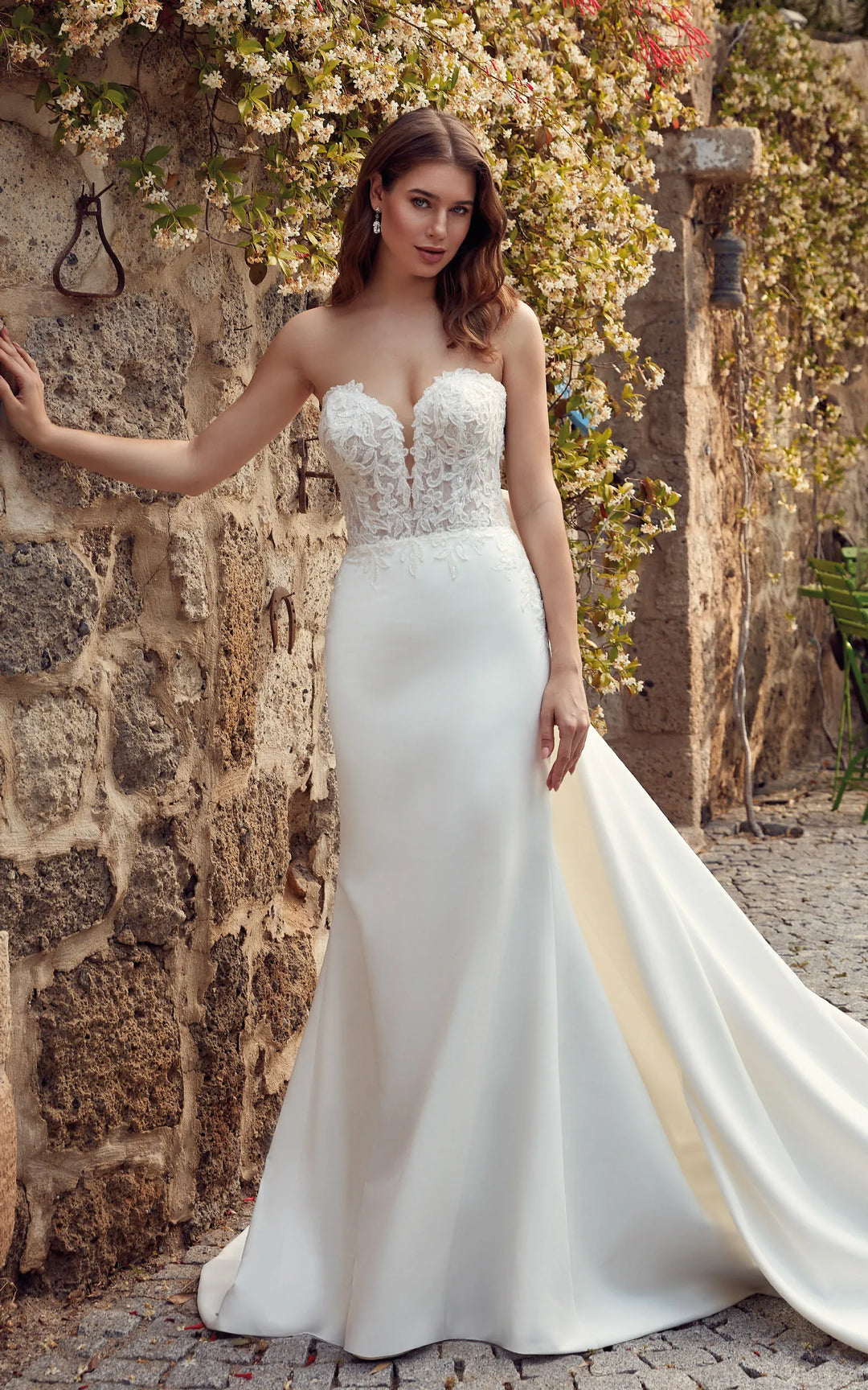 full front of eddy k marissa ivory satin sheath wedding dress with a matching train accents with lace and a bow