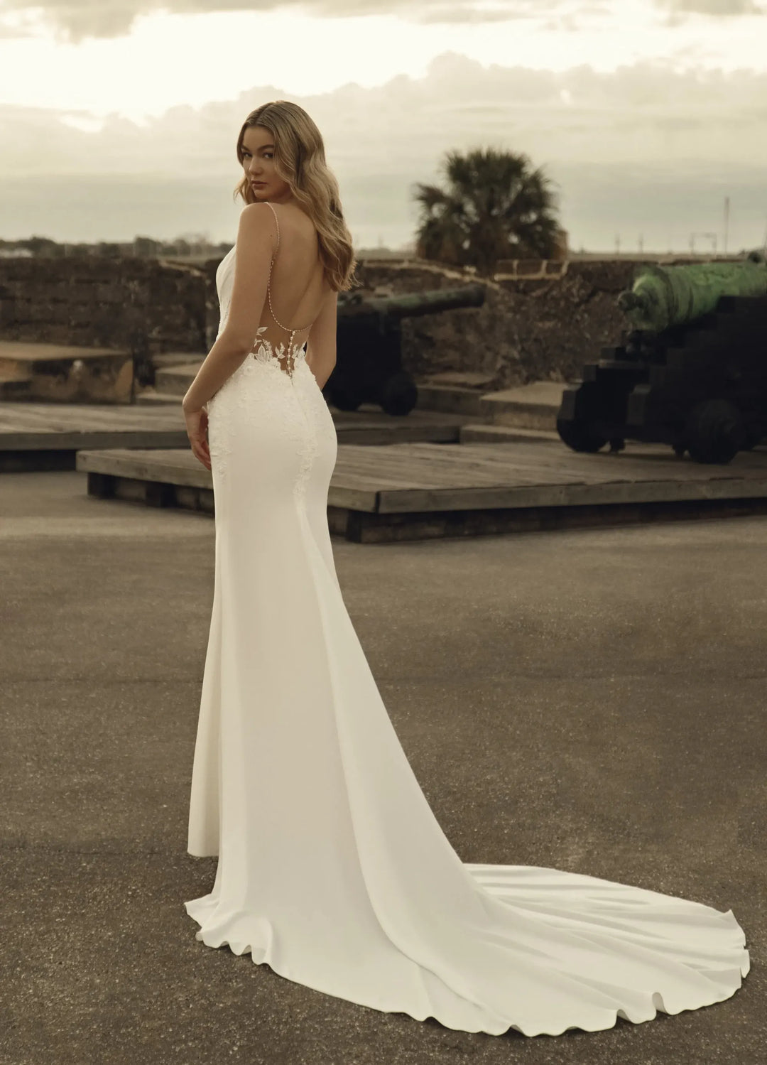 full back of elissar bridal chantelle ivory crepe fitted wedding dress with lace applques and a sheer open back