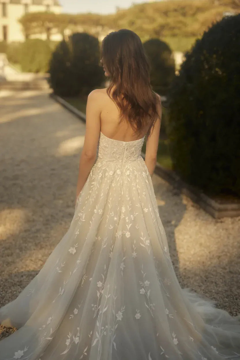 full back of enaura delilah tulle ball gown wedding dress covered with floral lace embellishments
