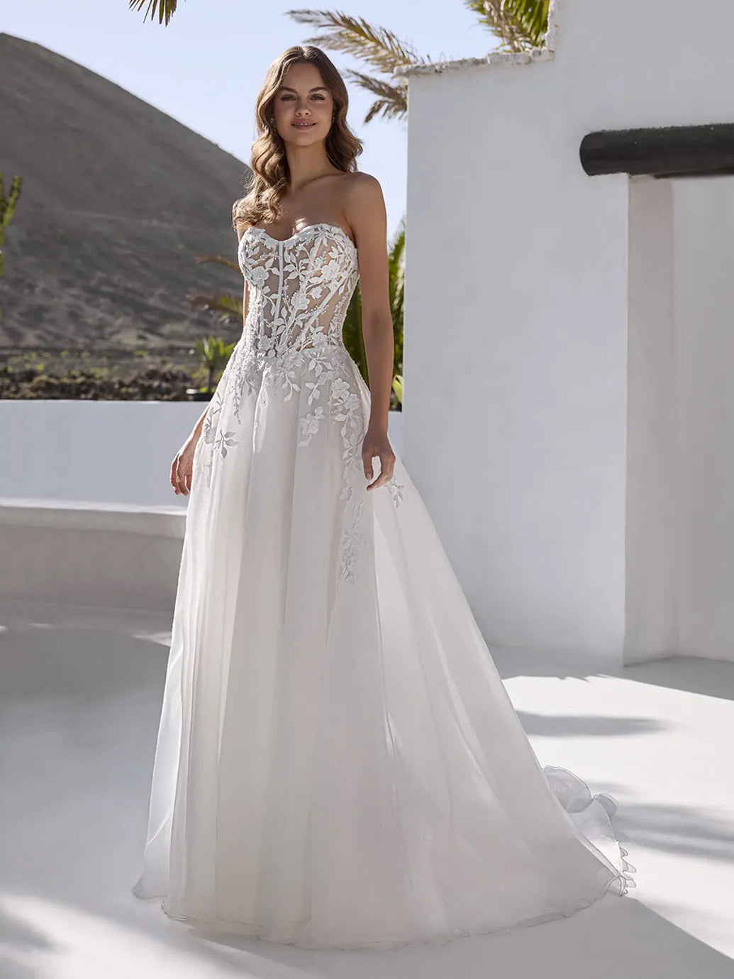 front of enzoani everly ivory organza a-line wedding dress showing the full front, with the strapless sweetheart neckline beaded lace bodice
