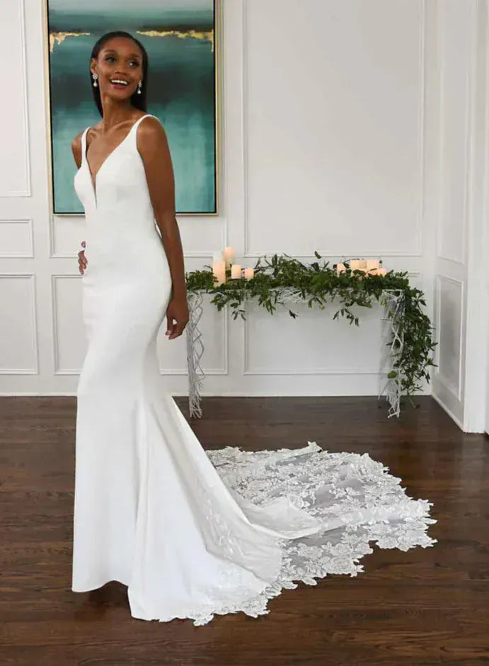 full front of essense d3112 ivory crepe fitted wedding dress with lace appliques and a v neckline