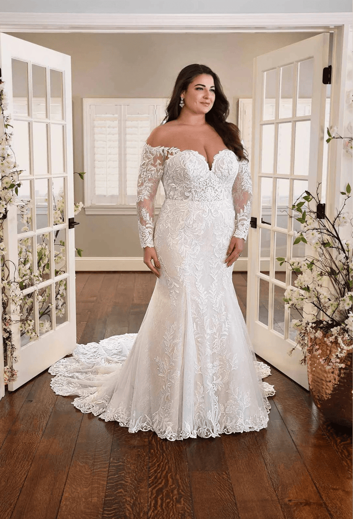 full front of essense of australia ivory lace fit and flare wedding dress featuring an off the shoulder neckline with long sleeves
