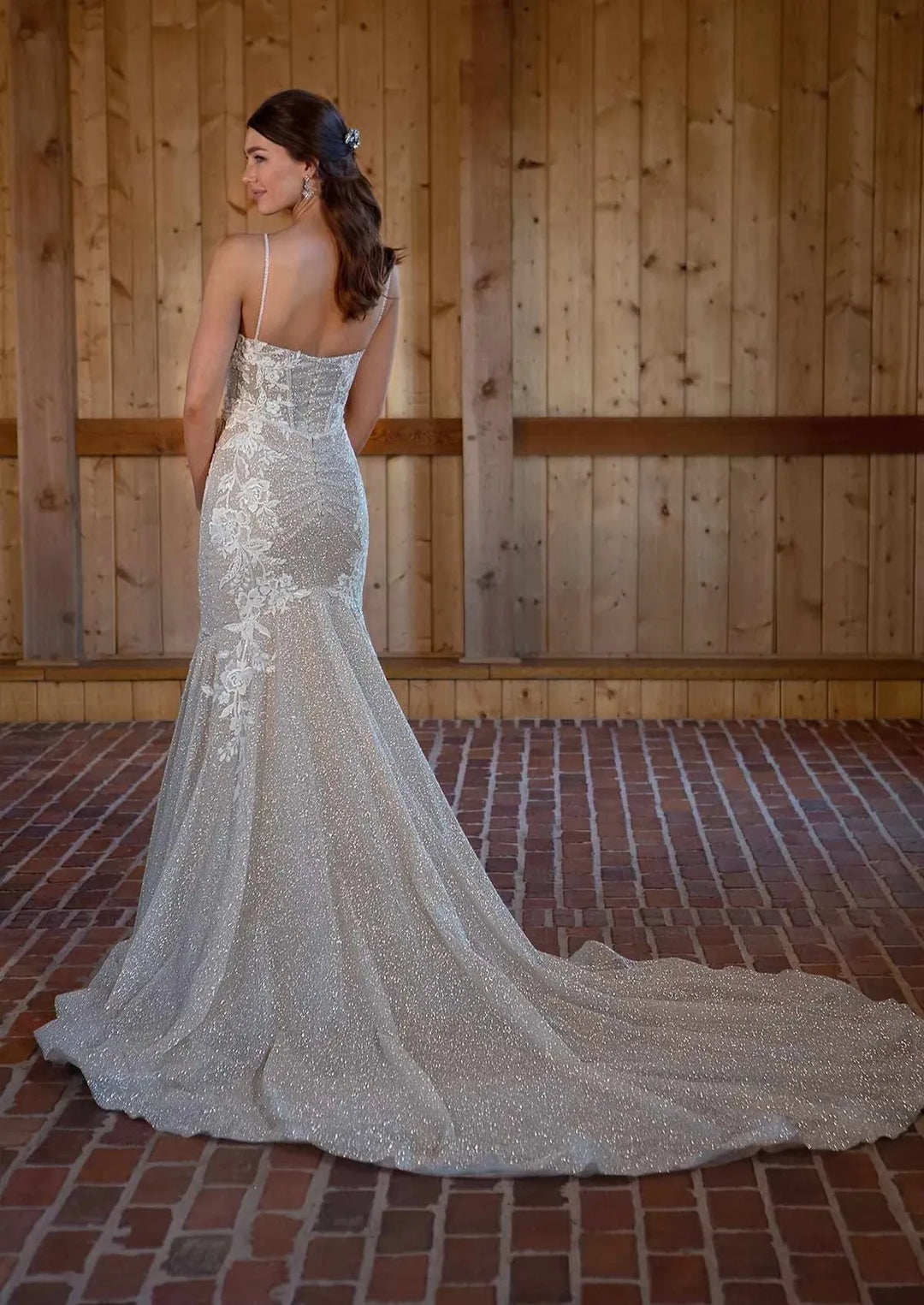 full back of essense d3486 ivory sparkle lace fitted wedding dress with a sparkly skirt and lace accents