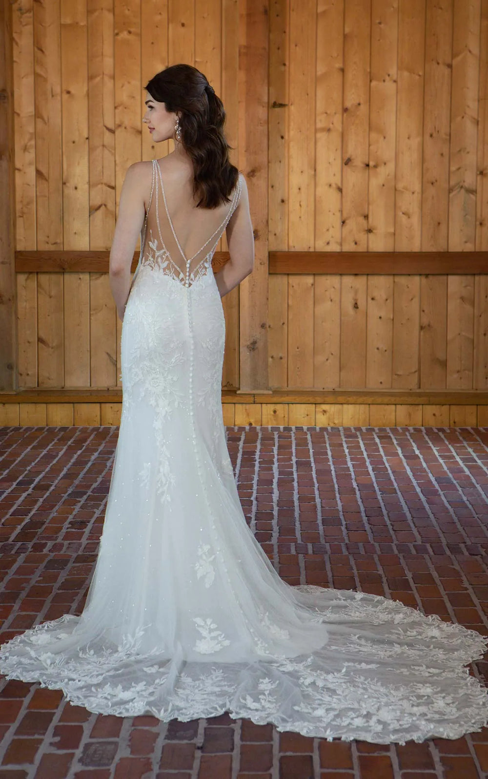 full back of essense d3657 ivory lace fitted wedding dress with a sheer back trimmed with beads, and a shaped lace train