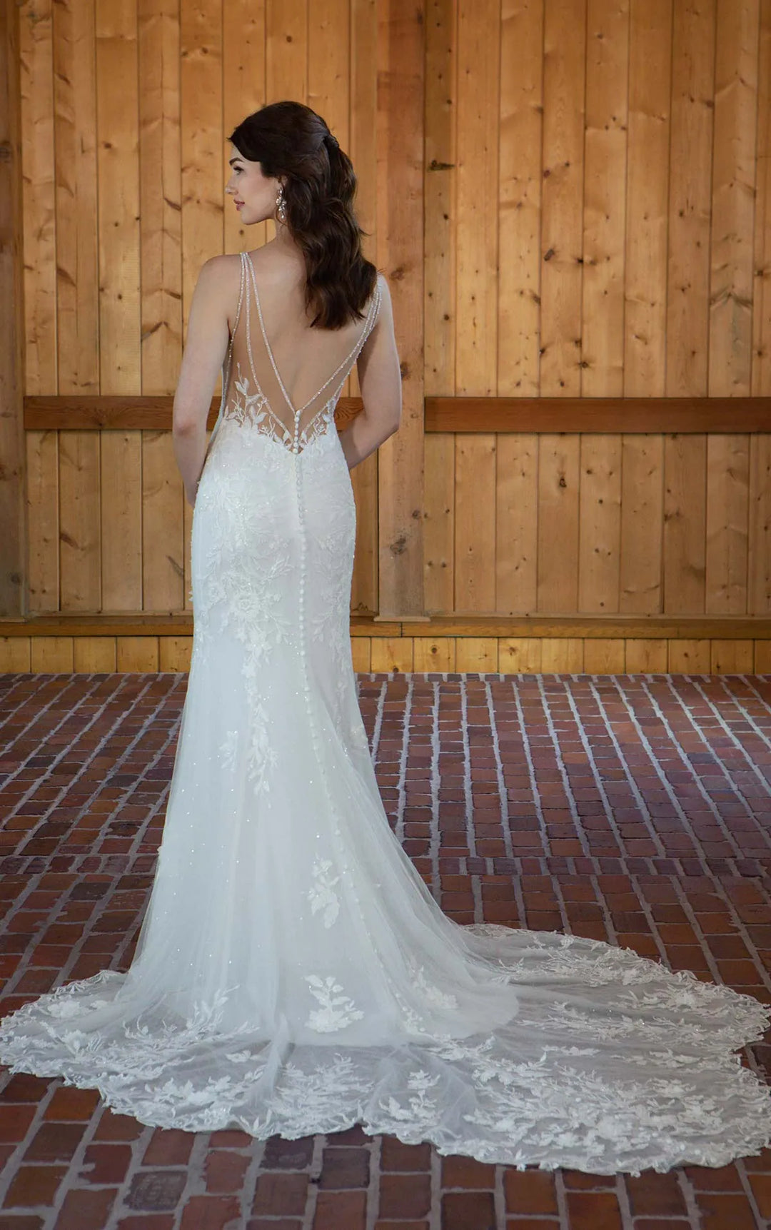 full back of essense d3657 ivory lace fitted wedding dress with a sheer back trimmed with beads, and a shaped lace train
