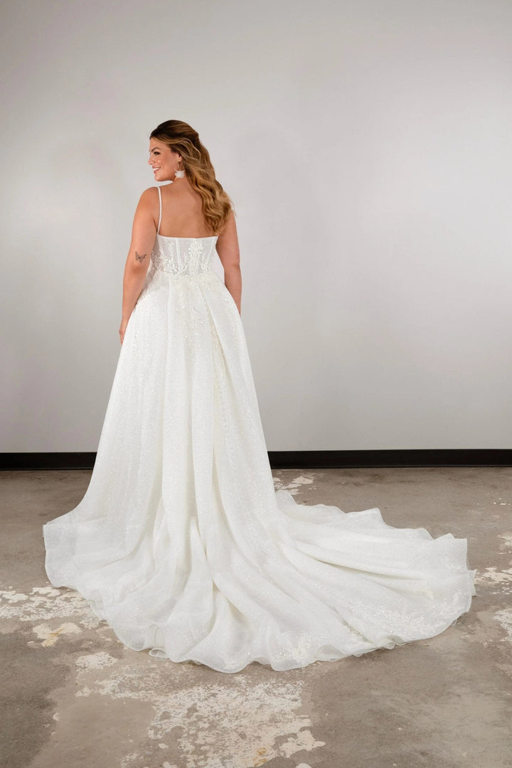 full back of essense of australia d3812 ivory tulle a-line wedding dress featuring a long train