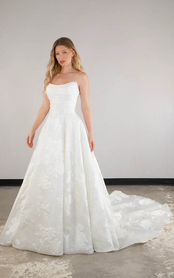 full front of essense of australia d3971 ivory jacquard a-line wedding dress featuring a strapless scoop neckline and long train