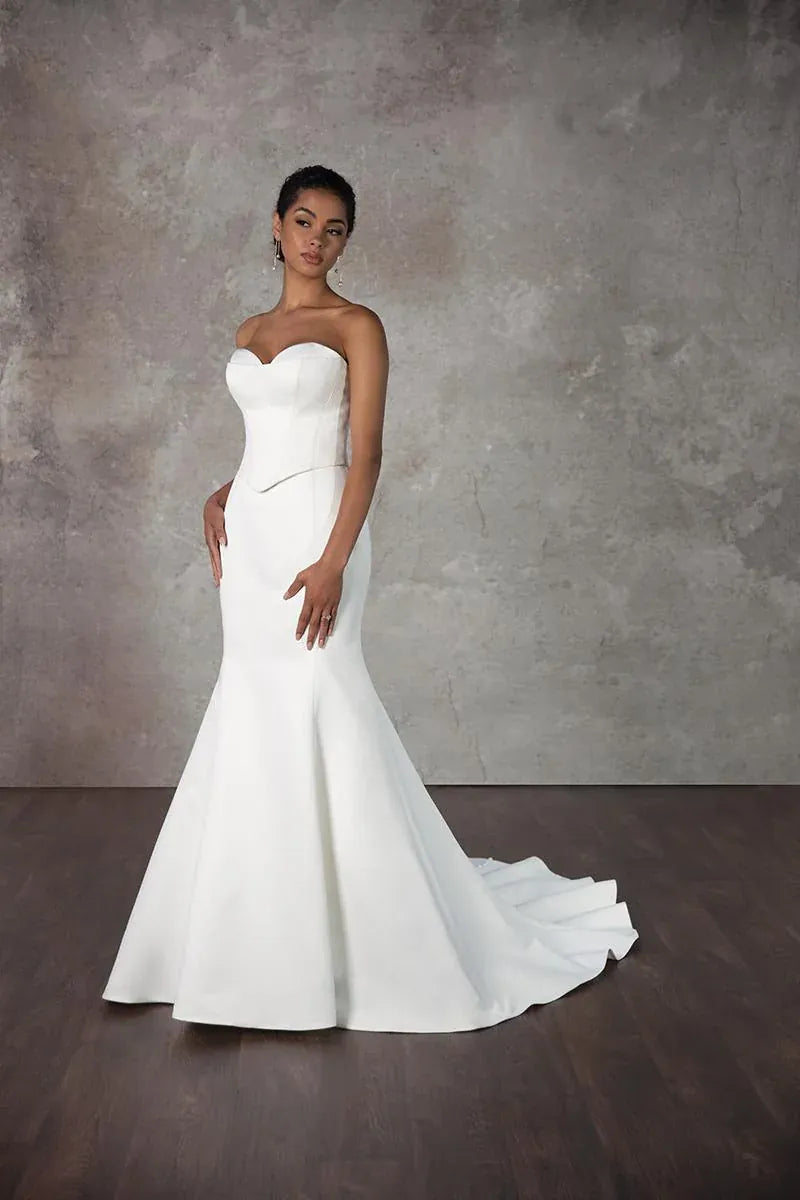 front of essense d4115 satin ivory fit and flare wedding dress with a basque waist and floral accents on the neckline