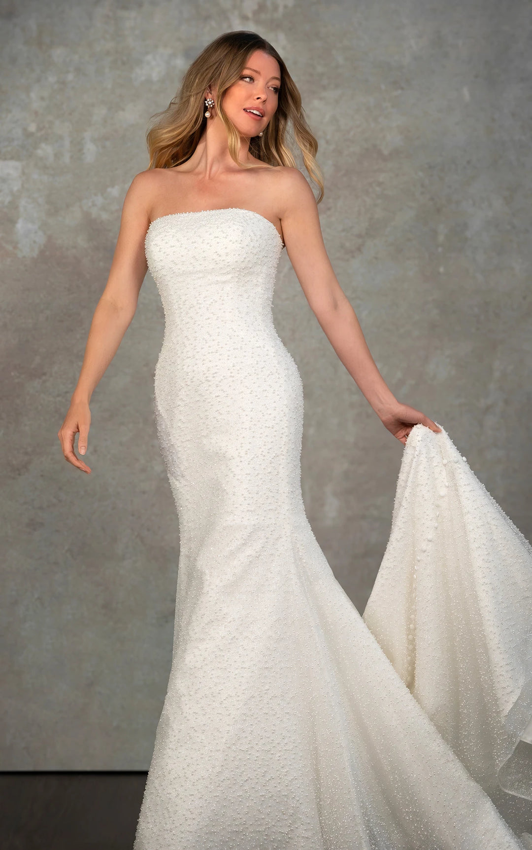 front of essense of australia d4182 ivory beaded fit and flare wedding dress with strapless straight neckline