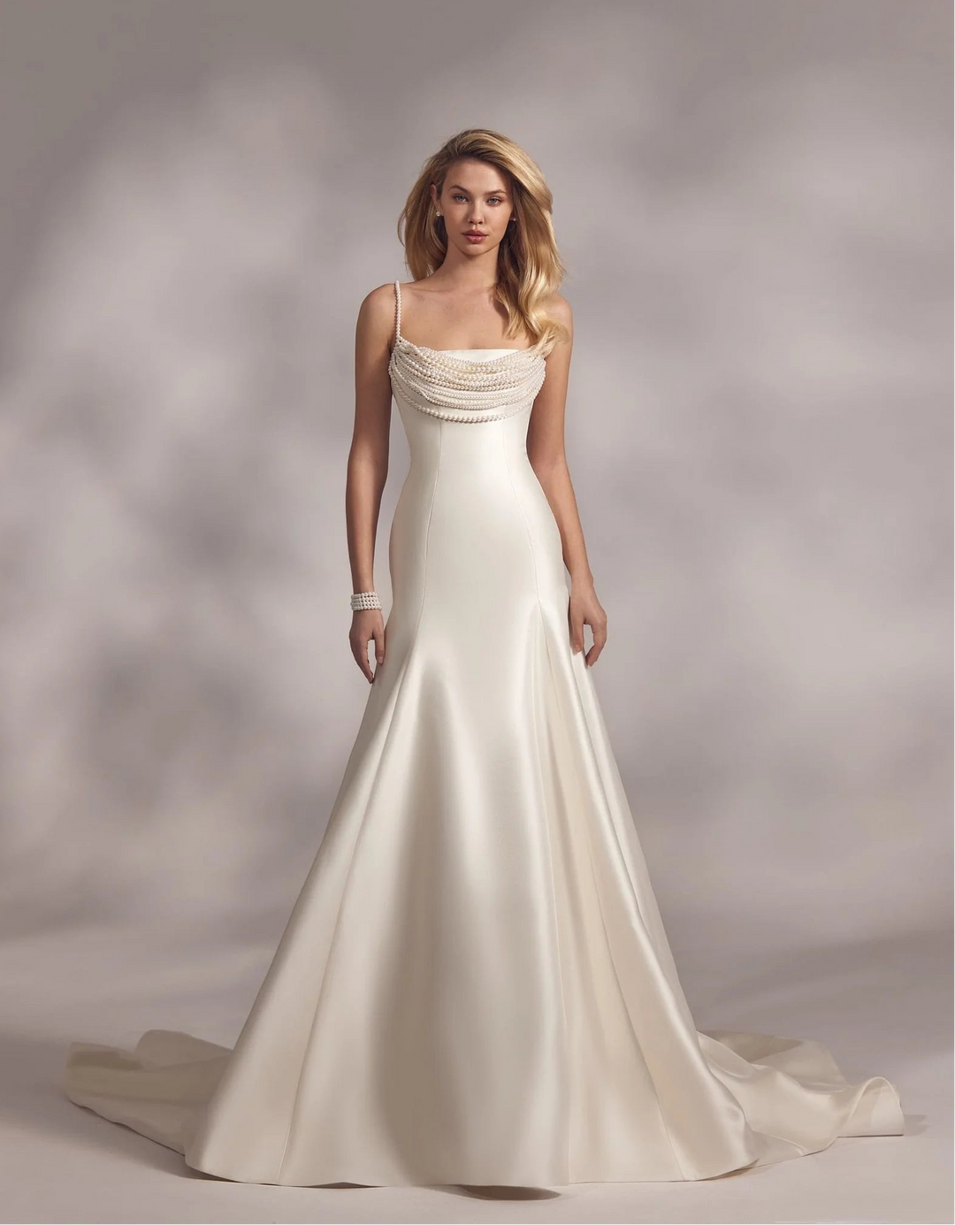 front of eva lendel ora ivory satin fitted wedding dress with beaded details on the neckline