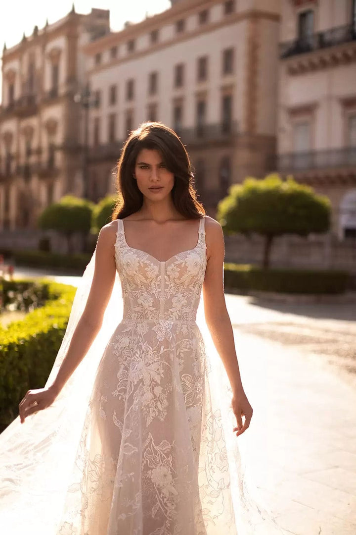 close up of eva lendel valentina ivory lace fitted wedding dress, showing the sweetheart neckline and fitted bodice