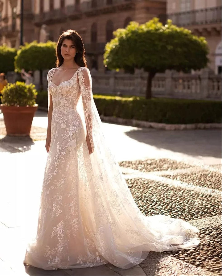 full front of eva lendel valentina ivory lace fitted wedding dress, showing the sweetheart neckline and floral print throughout