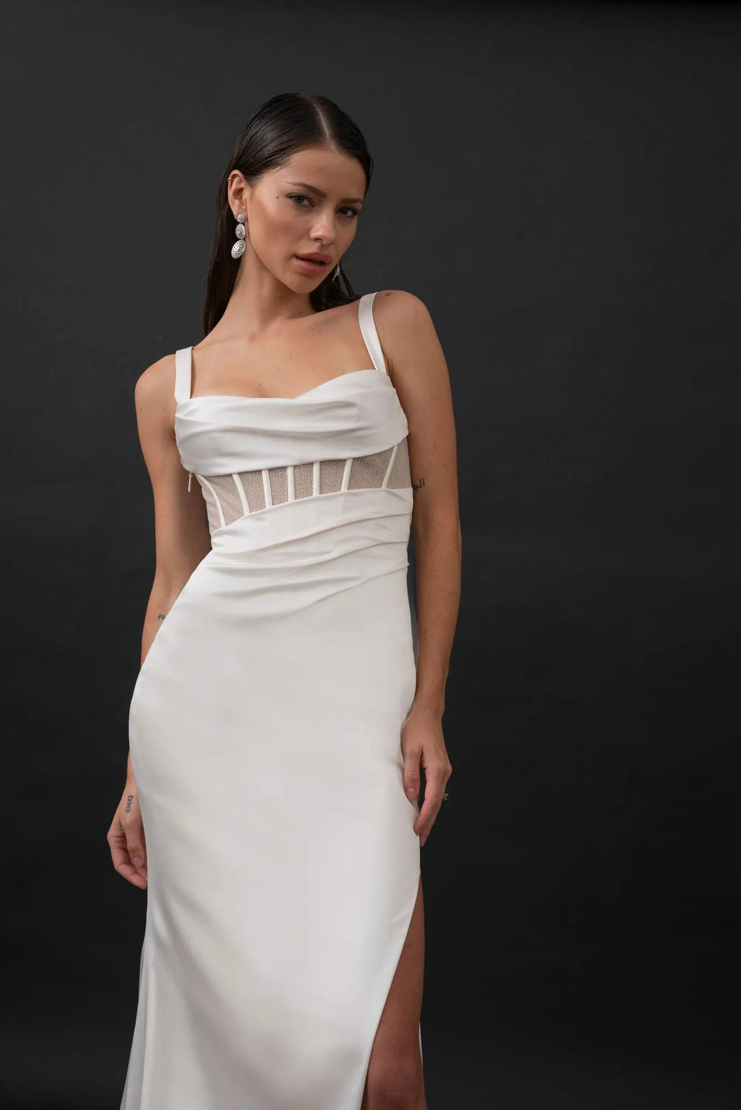 close up of evie young gia ivory satin sheath wedding dress showing the sheer bodice with a sweetheart neckline