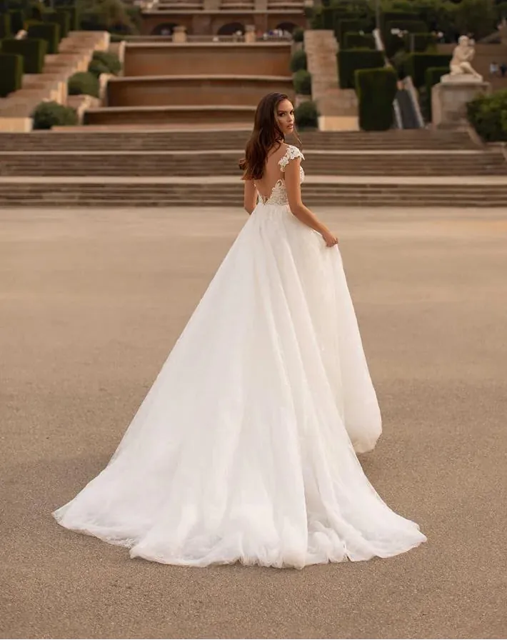 full back of giovanna alessandro celine beaded tulle a-line wedding dress with a sweetheart neckline and open back