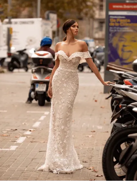 full front of giovanna alessandro charlotta blush fitted wedding dress with an off the shoulder neckline