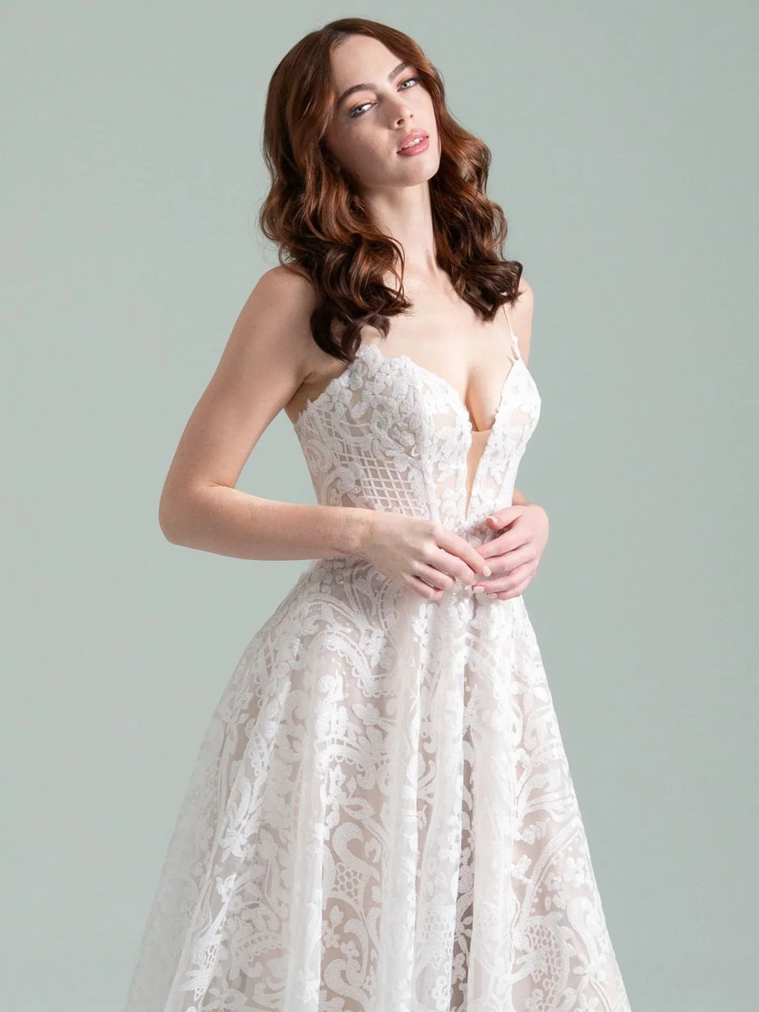 close up of hayley paige when i was the sky nude beaded lace a-line wedding dress, showing the deep v neckline and thin straps
